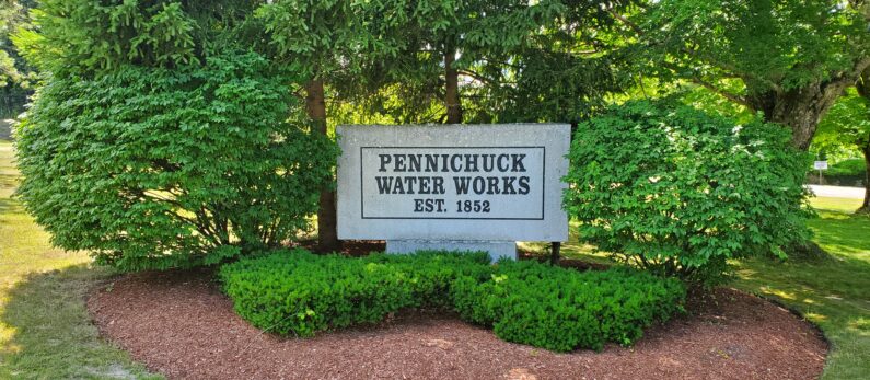Stone sign in front of Pennichuck Water Works