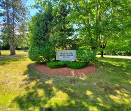 Photo of the granite Pennichuck sign, Nashua, NH.